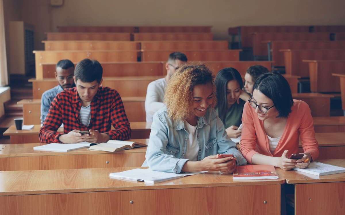 University students studying together in a lecture hall