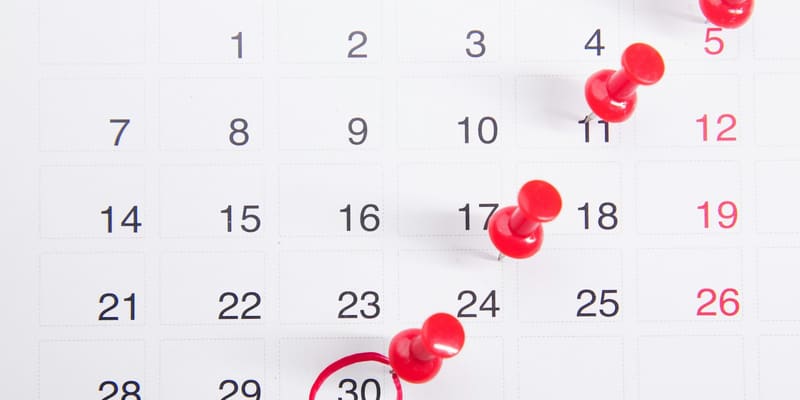 Calendar page with dates marked — Nepali calendar 2083 with festivals and holidays